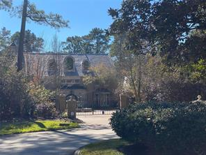 European-style estate facade with arched windows at 19005 Hwy 6