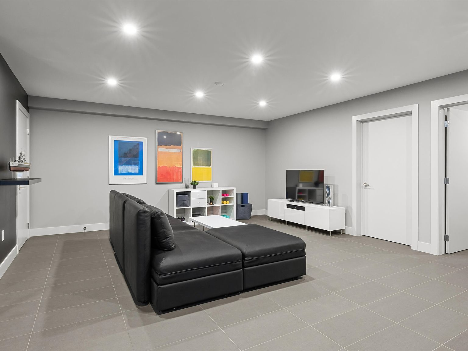 Lower level family room with recessed lighting
