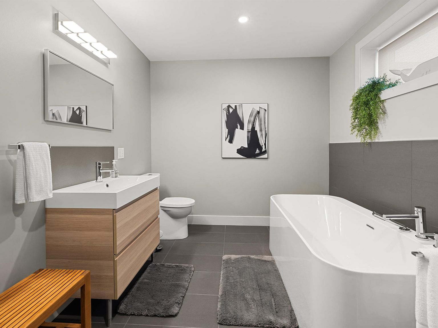 Bathroom with freestanding soaking tub