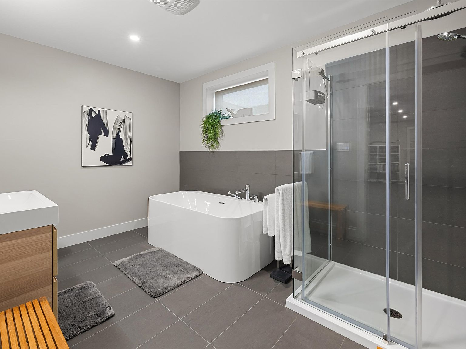 Primary bathroom with soaker tub and glass shower