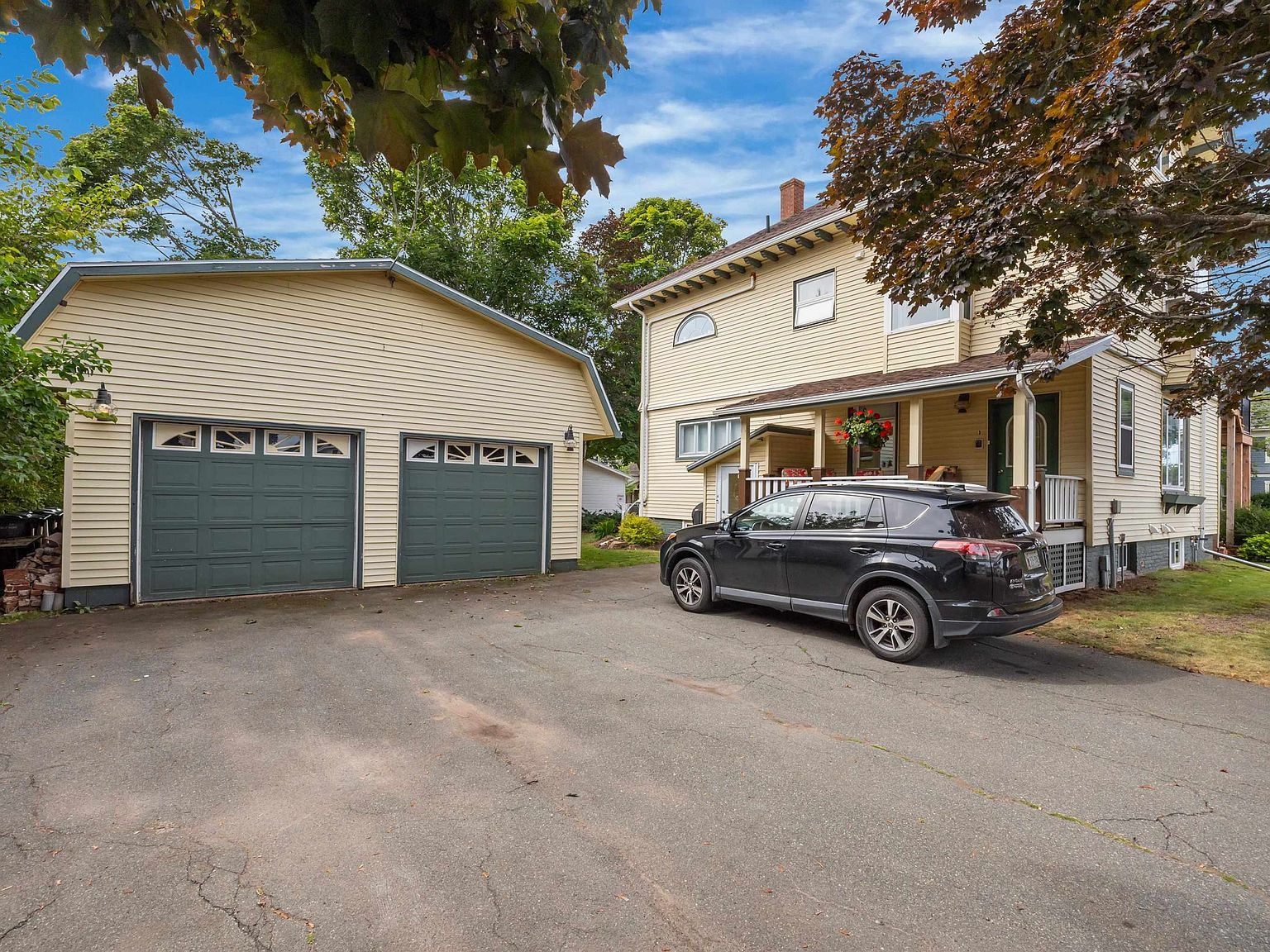 Detached garage and side porch entry