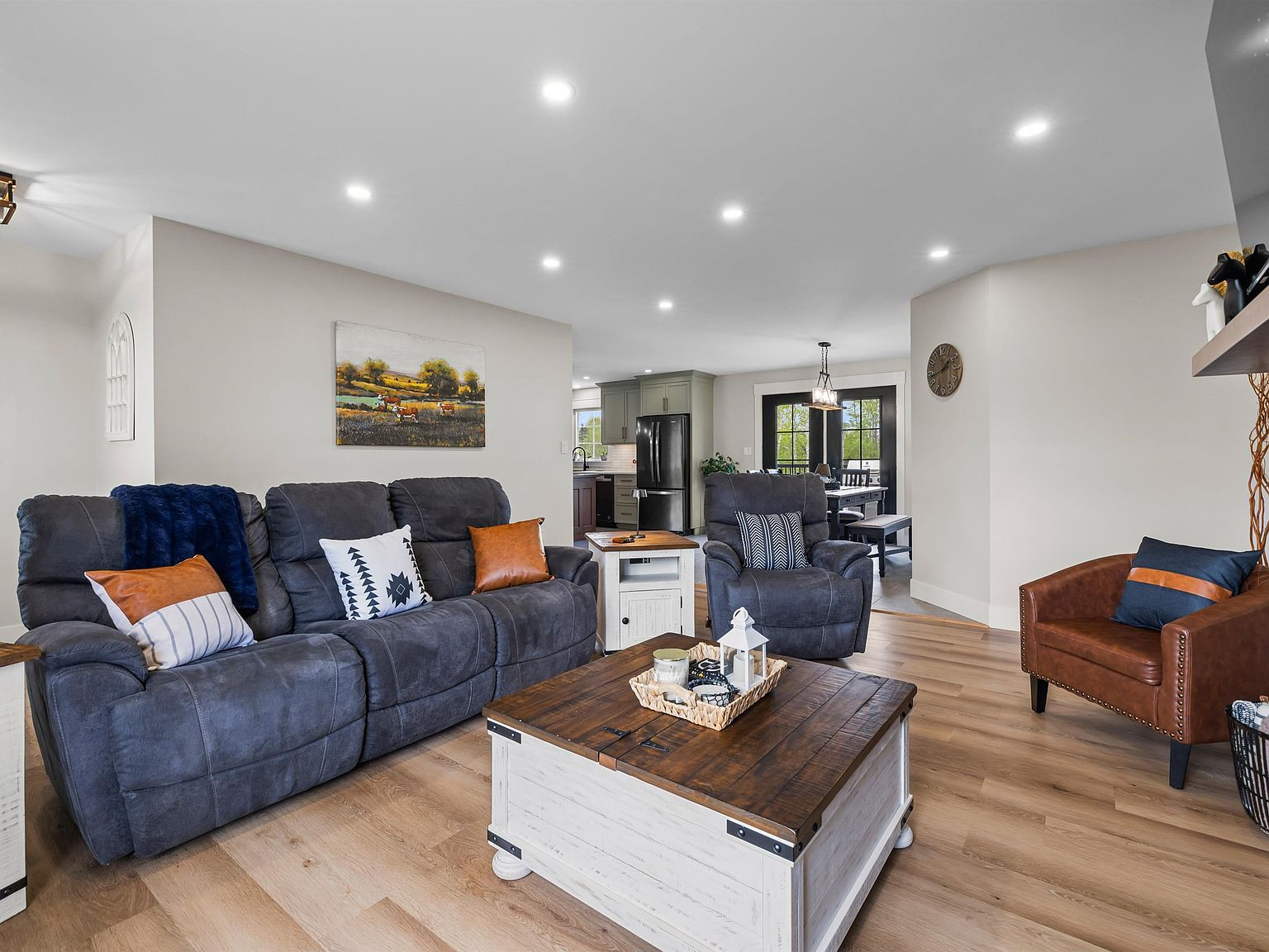 Open-plan living room looking toward dining area and kitchen