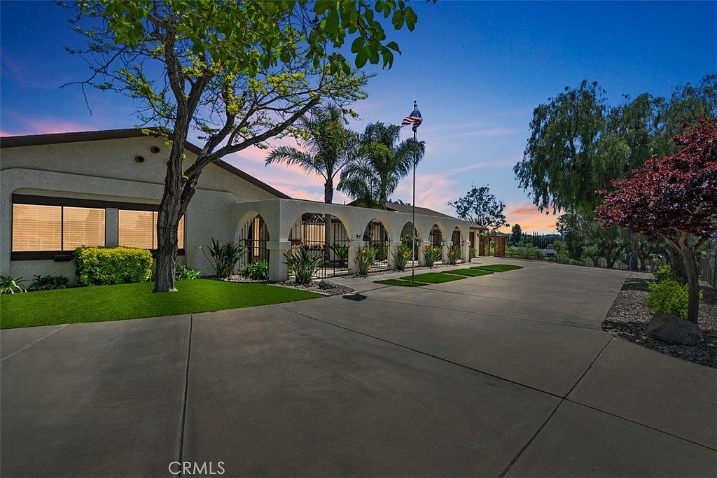 37790 Los Alamos Rd, Murrieta, CA — custom single-story estate with arched entry and mature landscaping