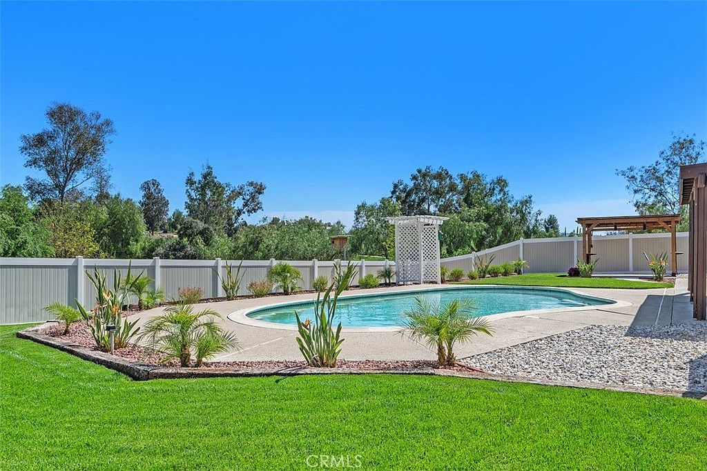 Pool area with pergola and cabana