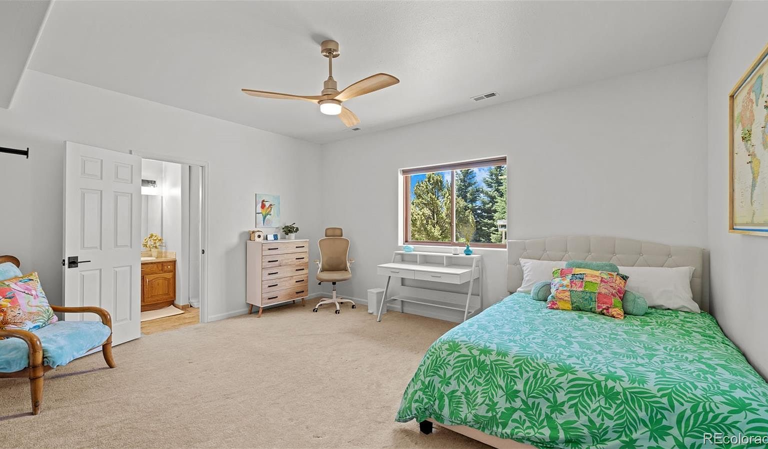 Secondary bedroom with vaulted ceiling