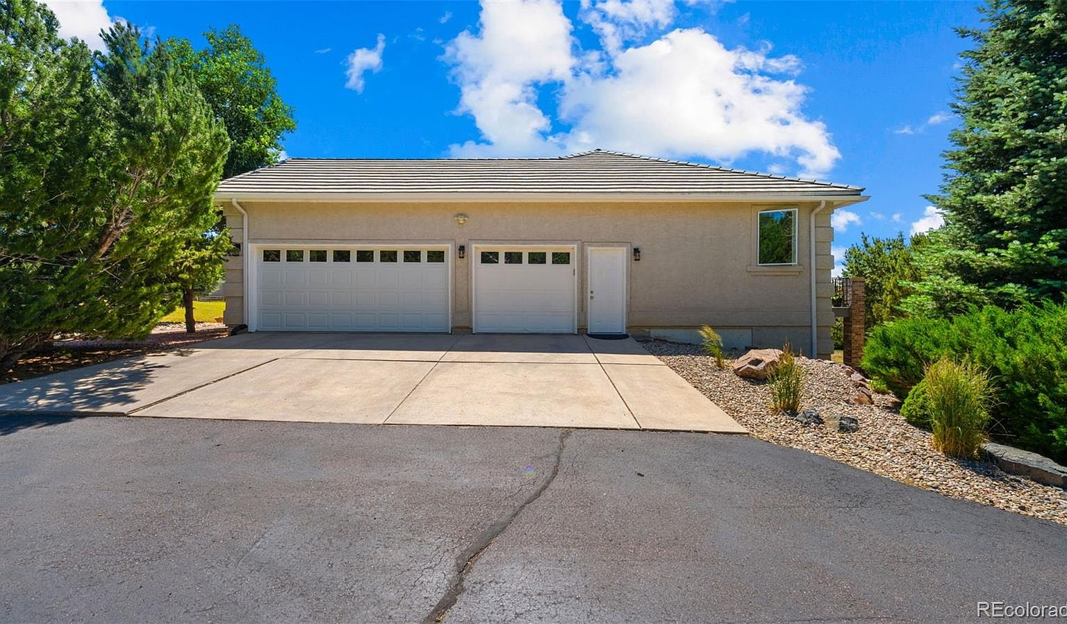 Oversized 3-car garage exterior