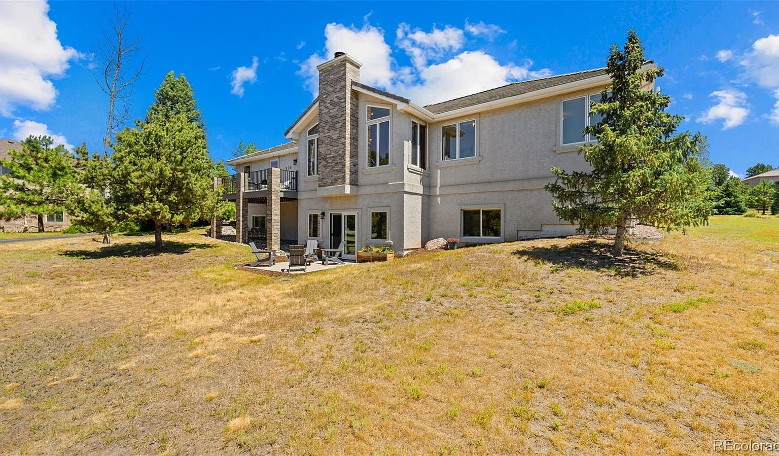 Rear exterior of walkout ranch home