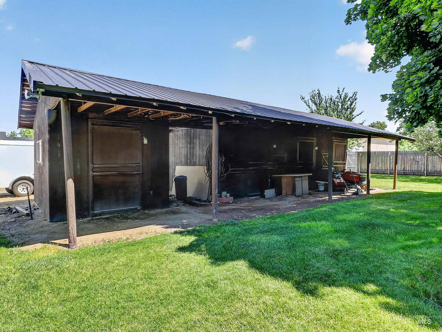 Powered 12x46 horse barn with covered porch area