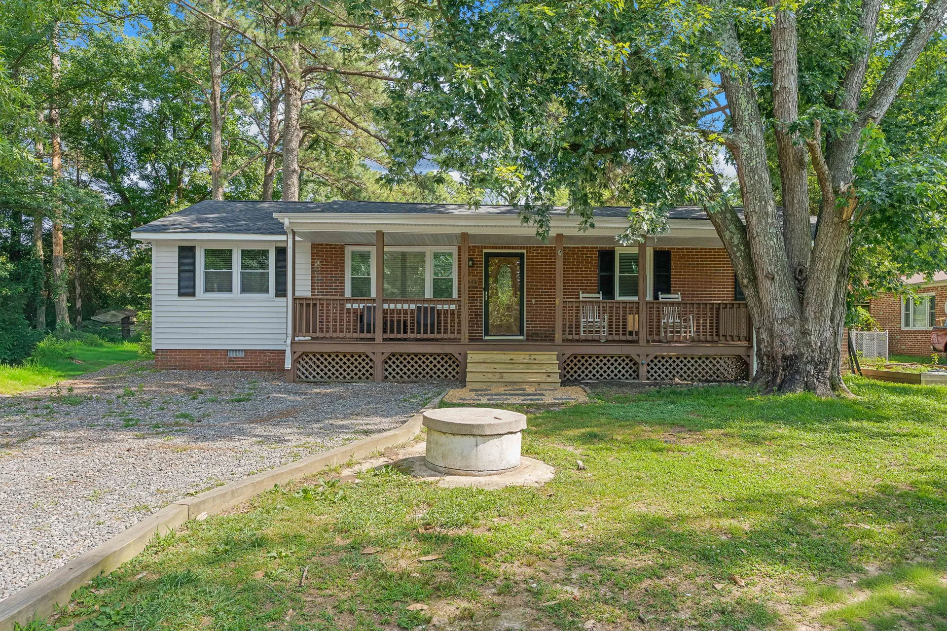 1343 Bartlett Rd front yard with mature tree