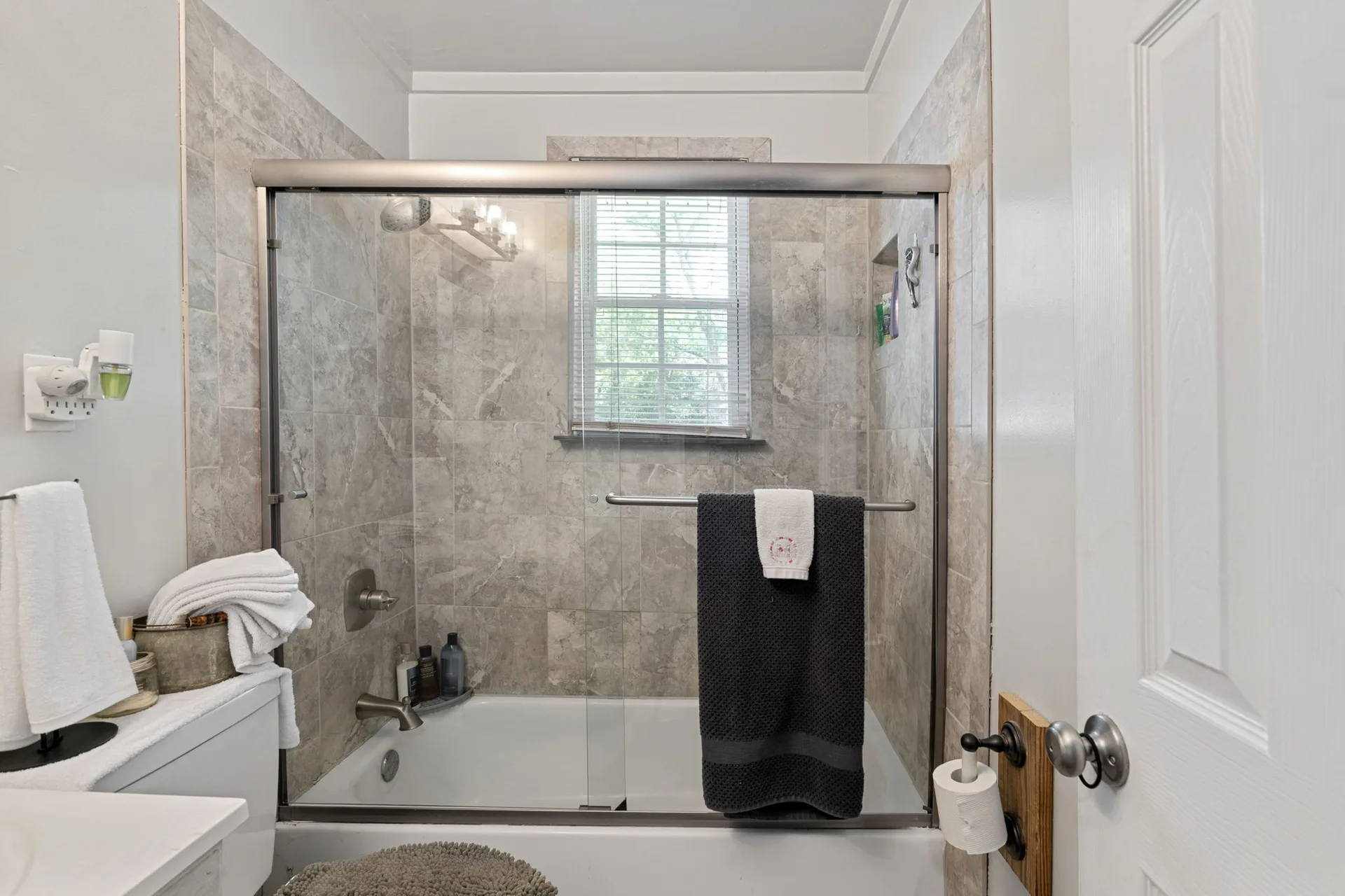 Updated bathroom with shower-tub combo