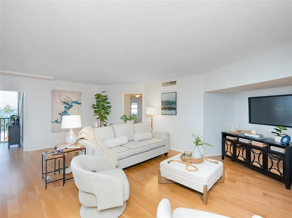 Furnished living room with modern coastal decor