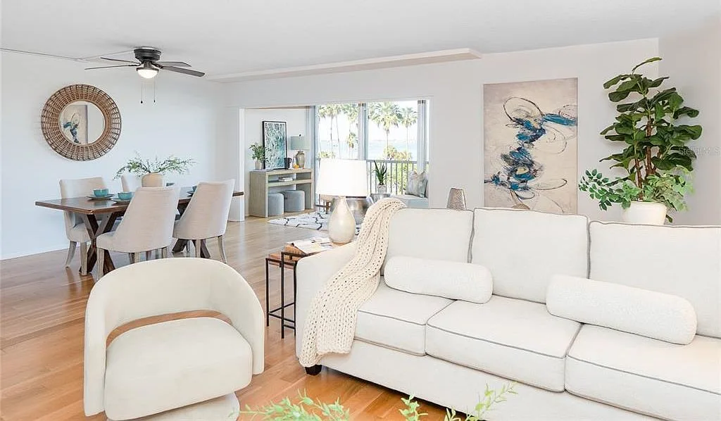 Open-plan living and dining area with bay window