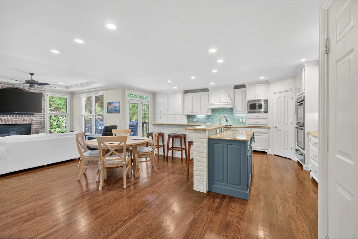 Open-concept kitchen flowing into the living area