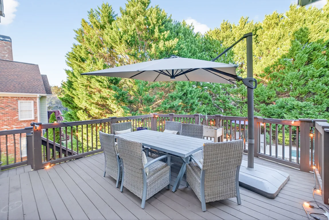 Elevated composite deck with dining furniture