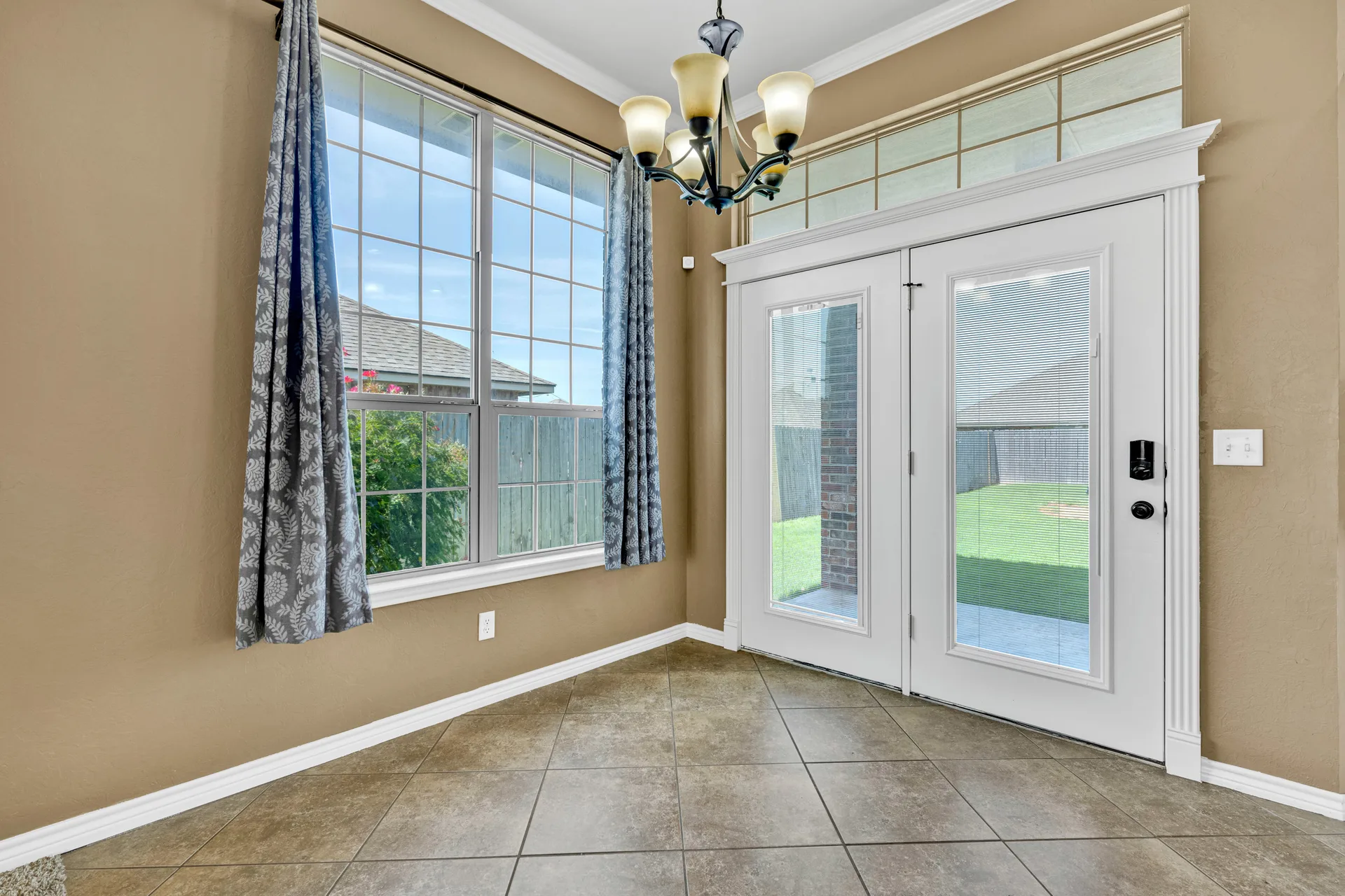 Dining nook with natural light from large window