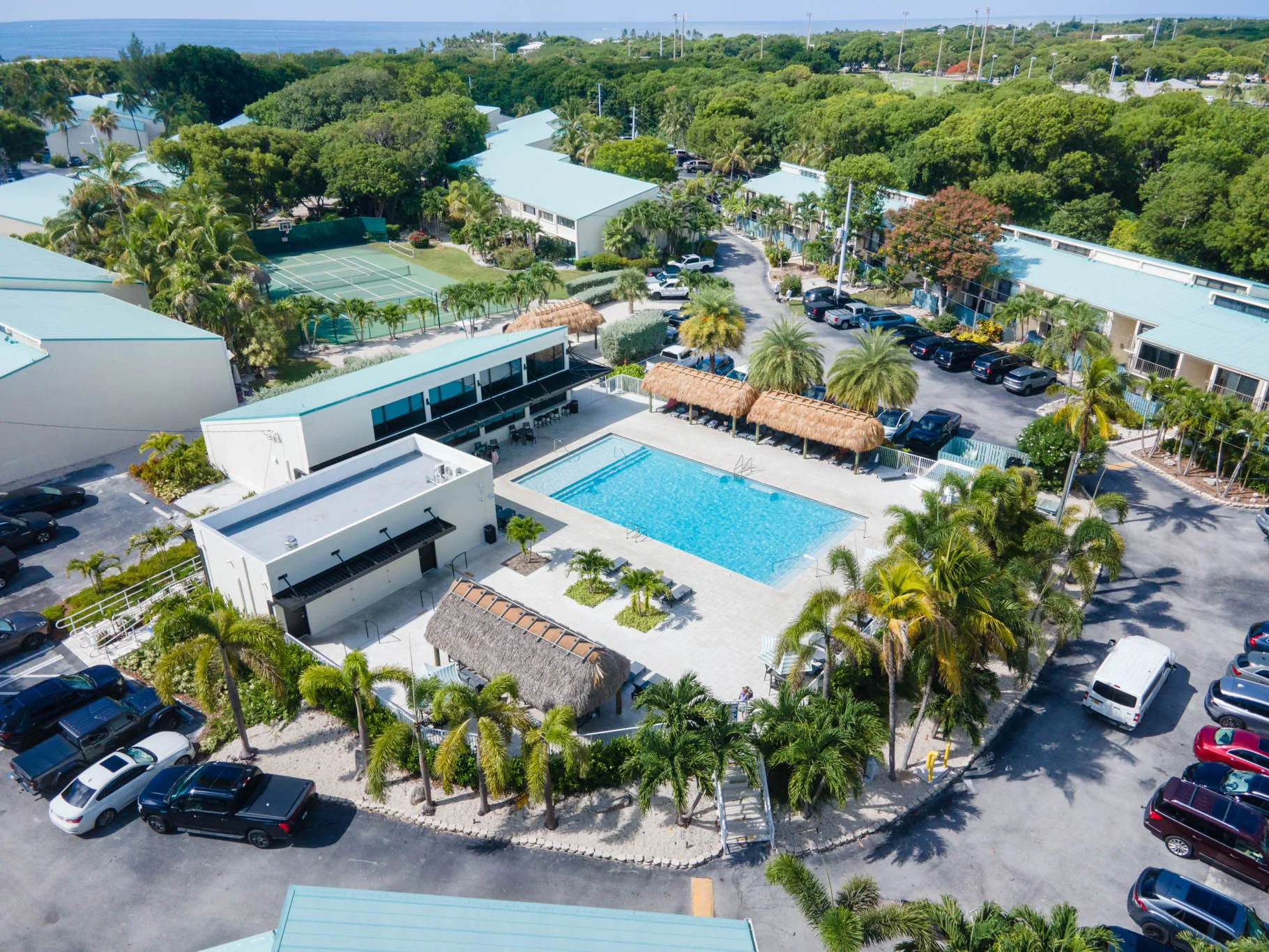 Community pool with cabana huts