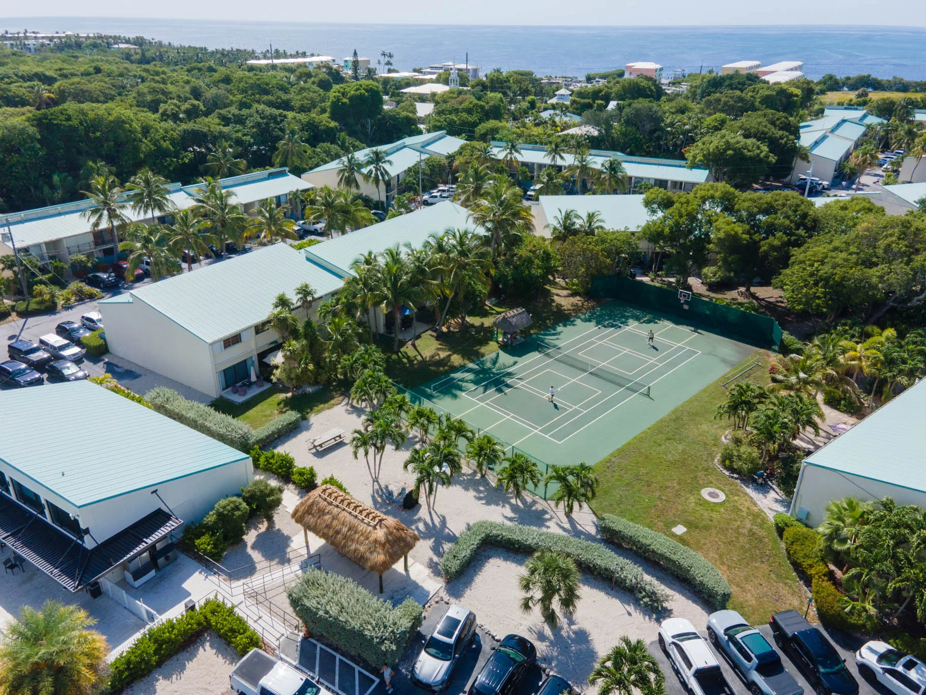 Aerial view of tennis courts and community layout