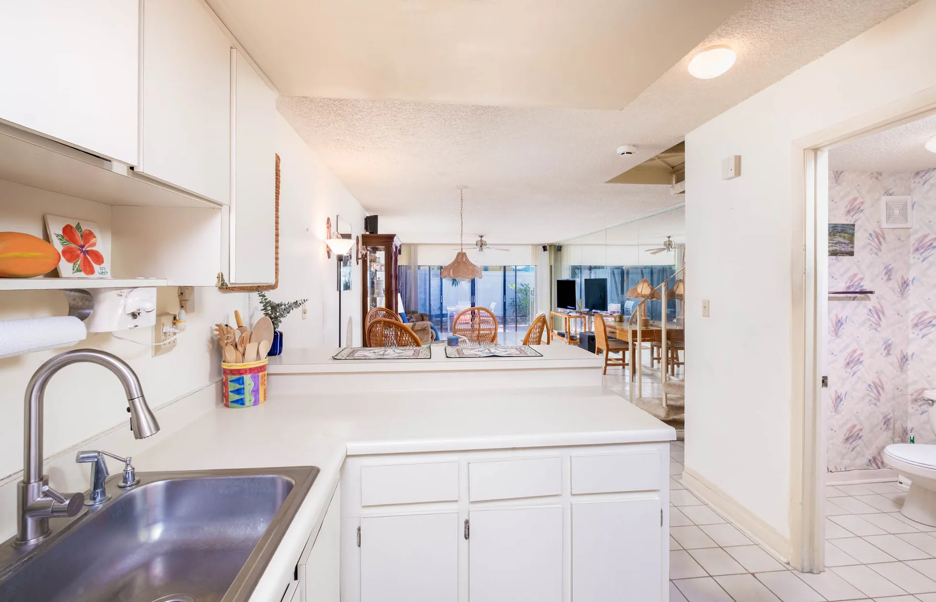 Kitchen looking into dining and living area