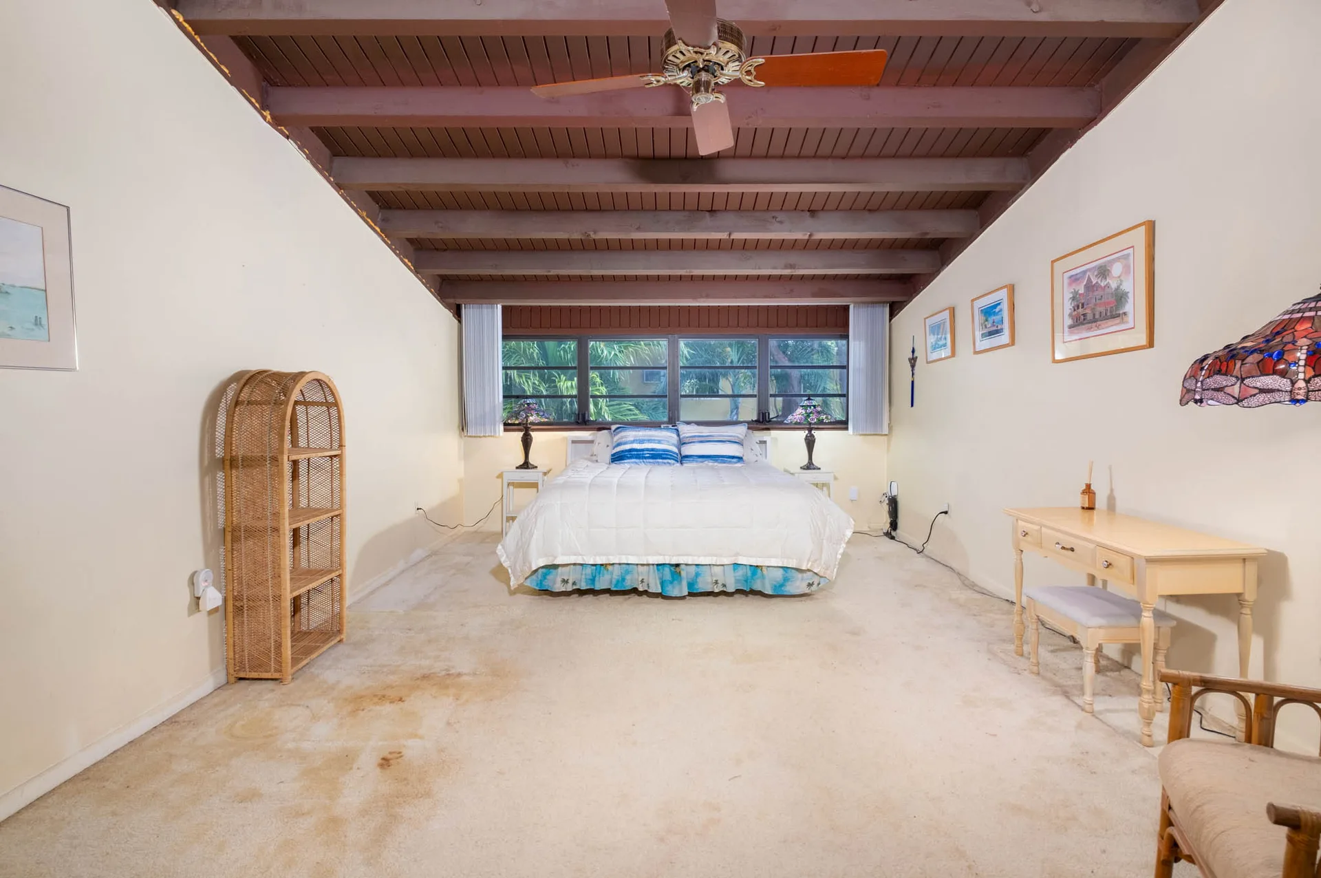 Master bedroom with vaulted beam ceiling