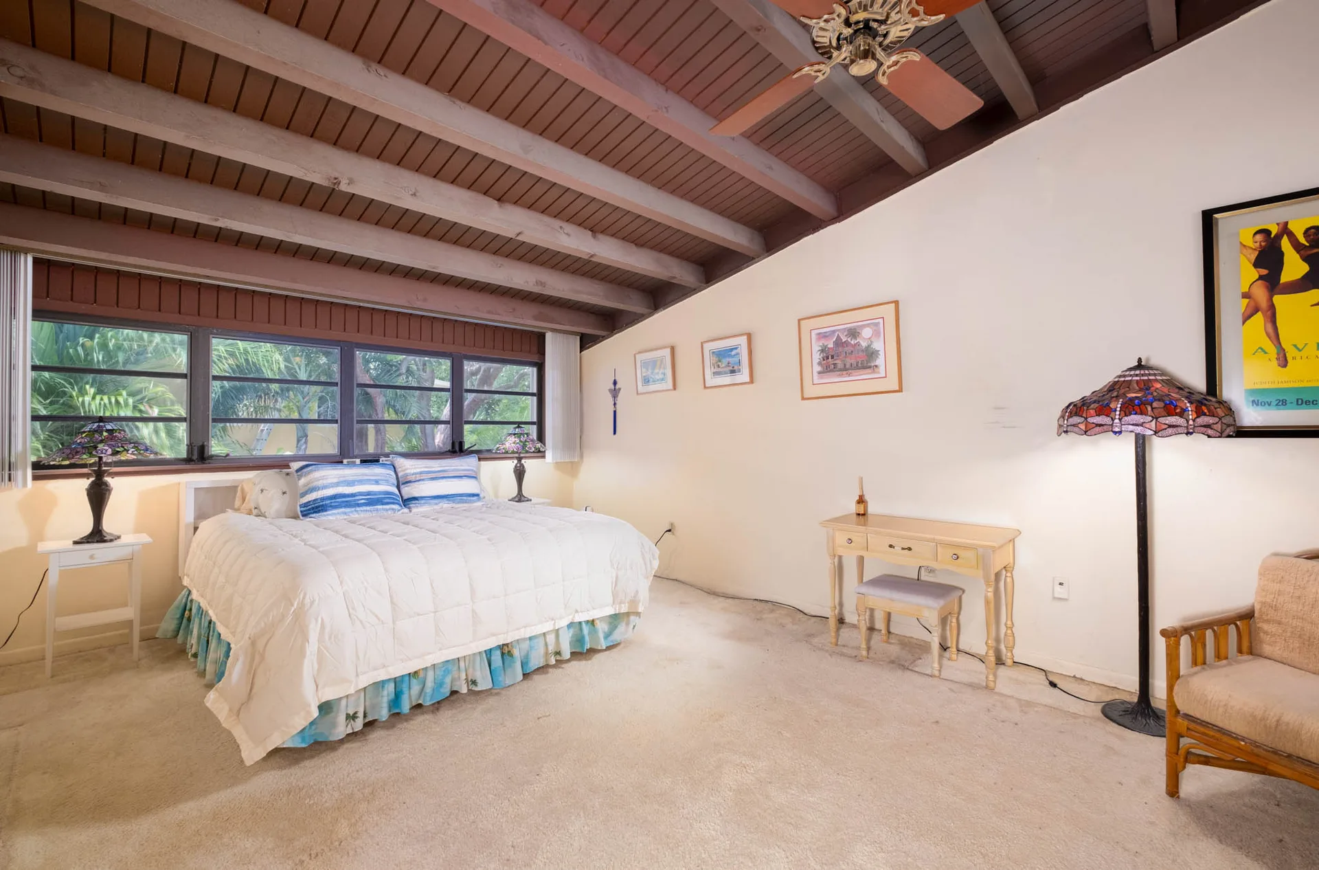 Master bedroom showing exposed wood beam ceiling detail