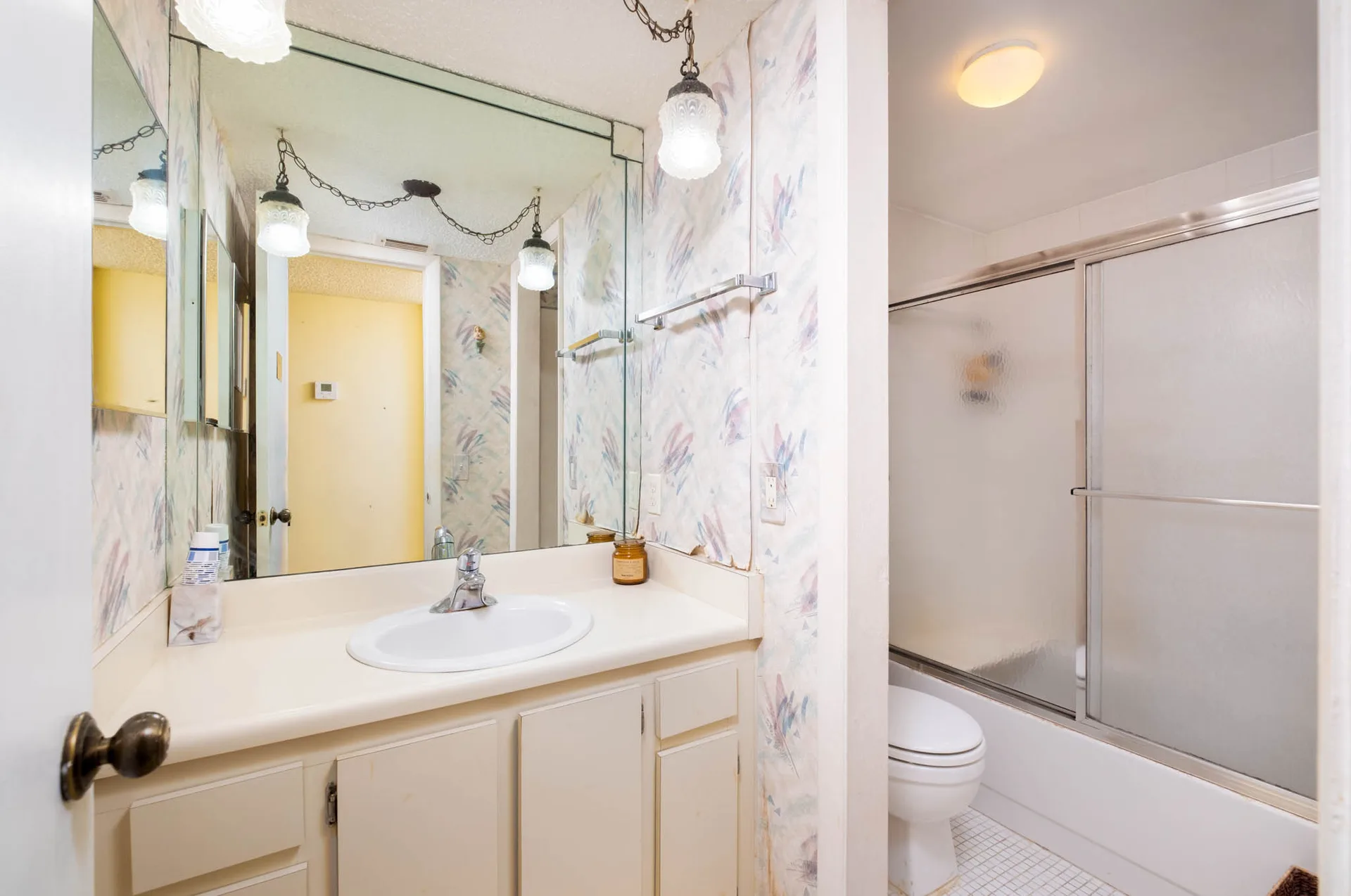 Bathroom vanity with shower and tub combo