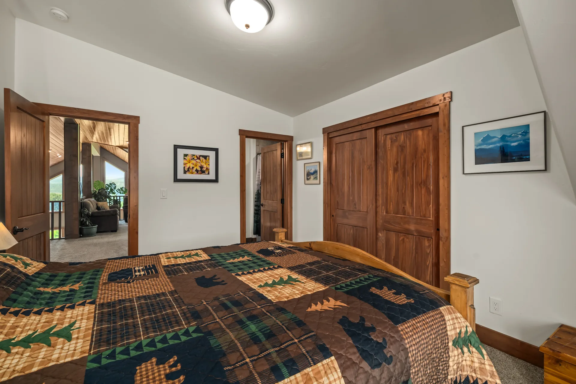 Mountain bedroom with stained wood trim and rustic charm