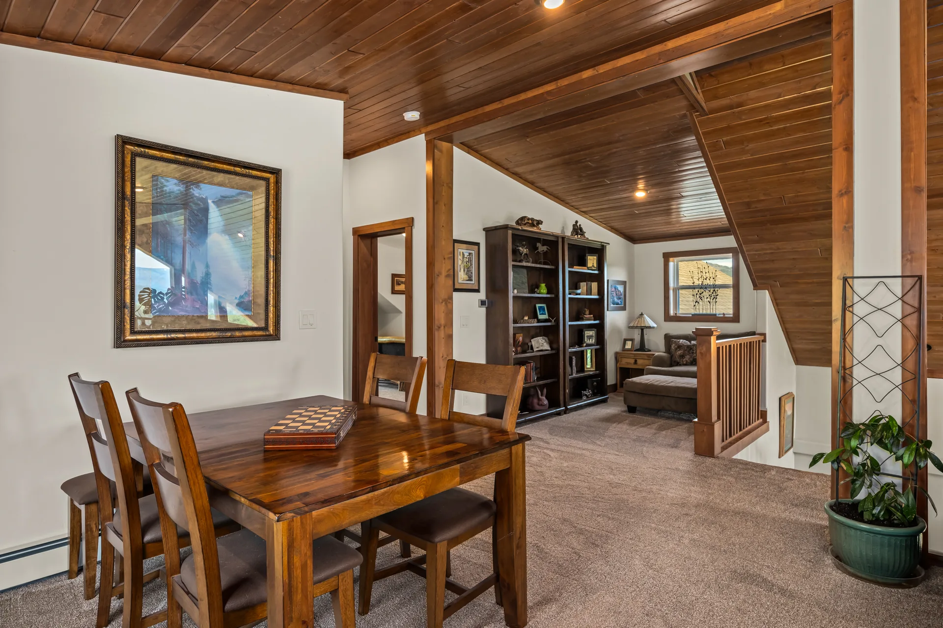 Dining room connected to upper-level loft living space