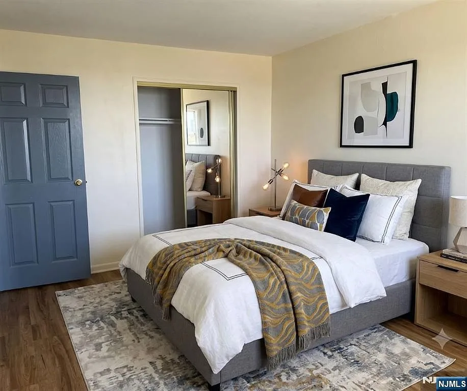 Renovated bedroom with new flooring and natural light