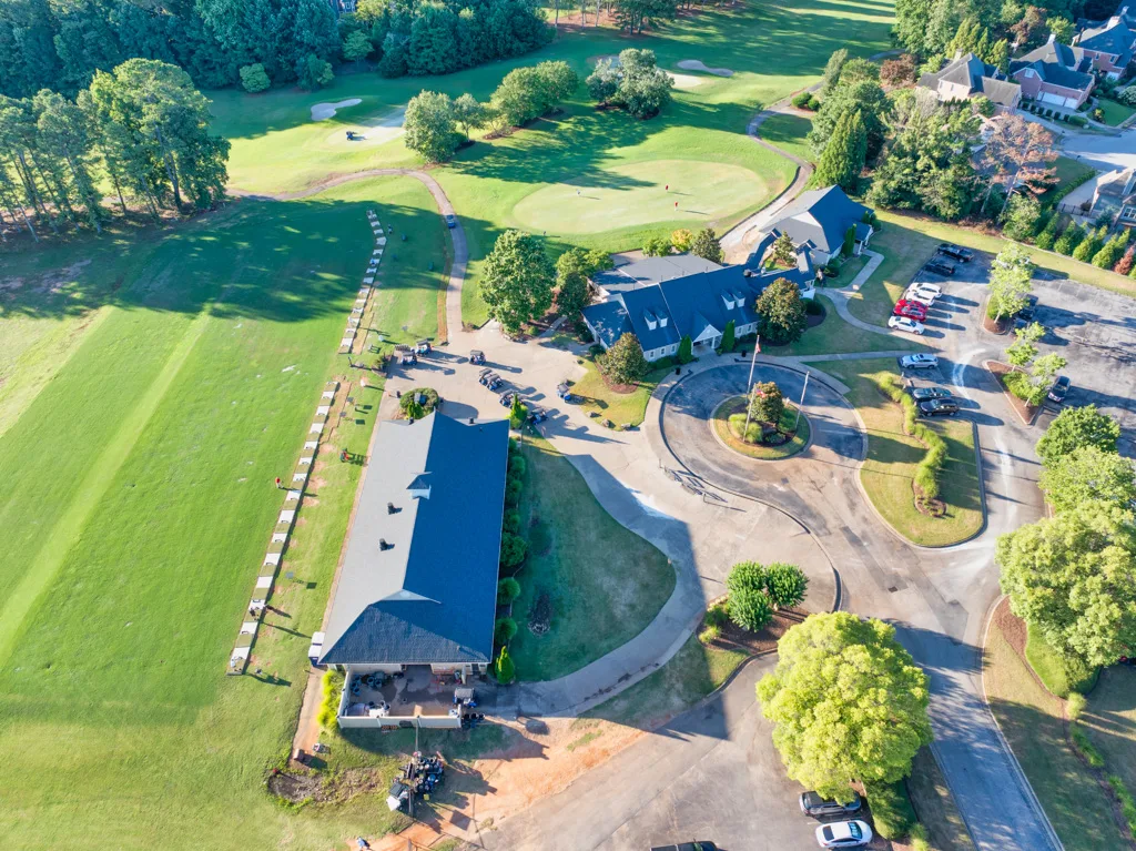 Aerial drone view of the Trophy Club of Apalachee Golf Course clubhouse and surrounding fairways