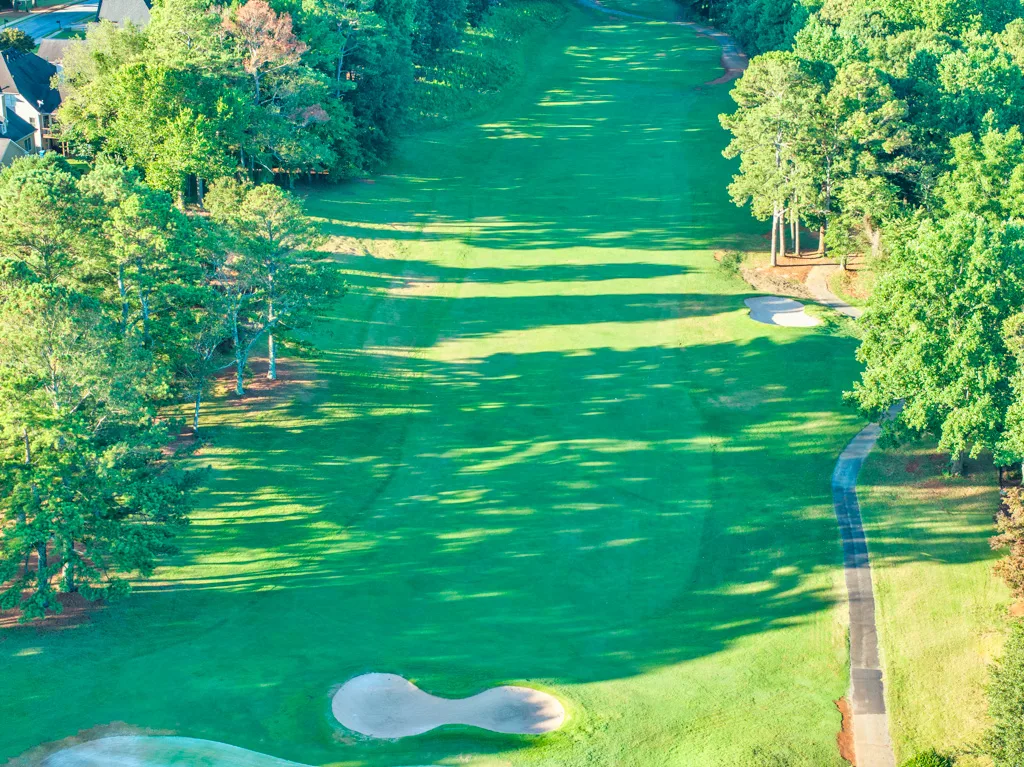 Aerial overview of golf course fairway