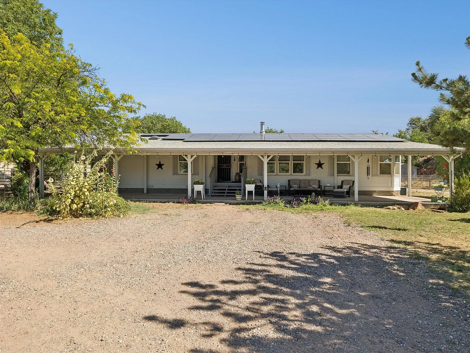 Exterior front facade of the ranch-style home at 191 N Cornerstone Way in Star Valley Arizona