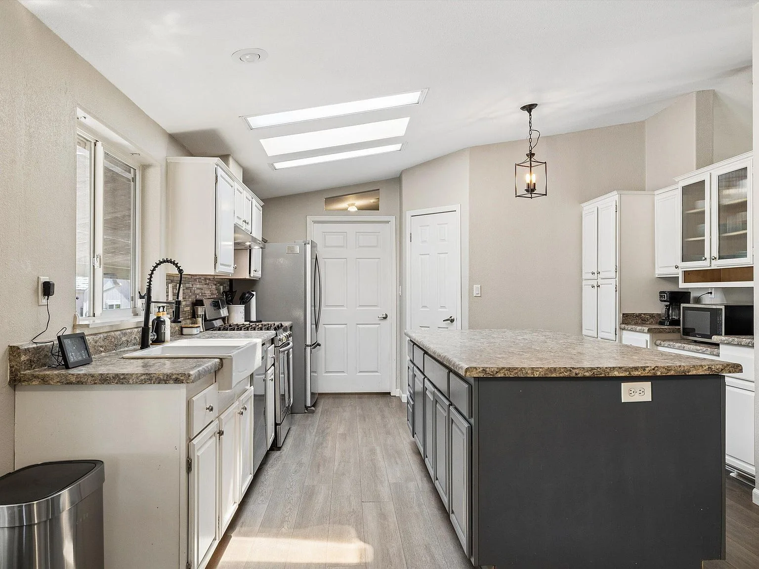 Remodeled kitchen with massive island and skylights
