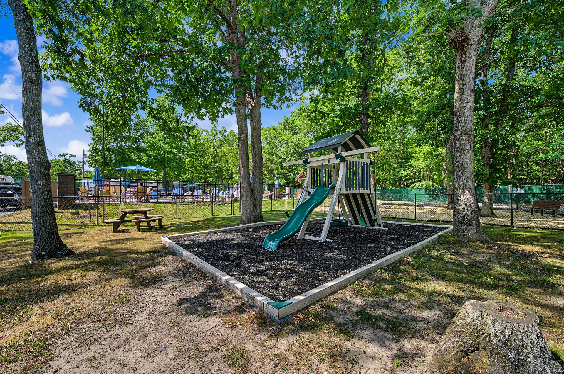 Community playground with playset and picnic area