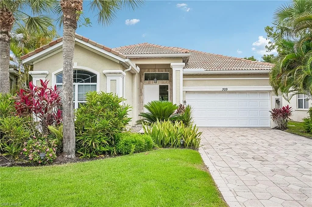 Front exterior of 309 Harvard LN, a Mediterranean-style home in Glen Eagle Golf and Country Club