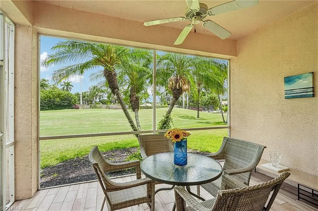 Screened-in lanai overlooking the Glen Eagle golf course