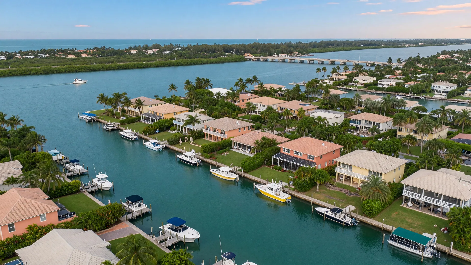 Aerial view of canal-front waterfront homes and private docks in Lake Clarke Shores
