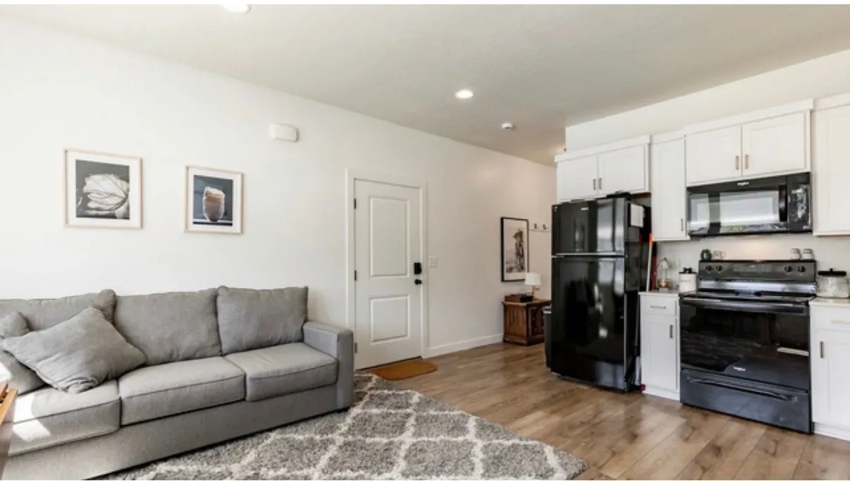 The main-level ADU, a bright living space with its own kitchen