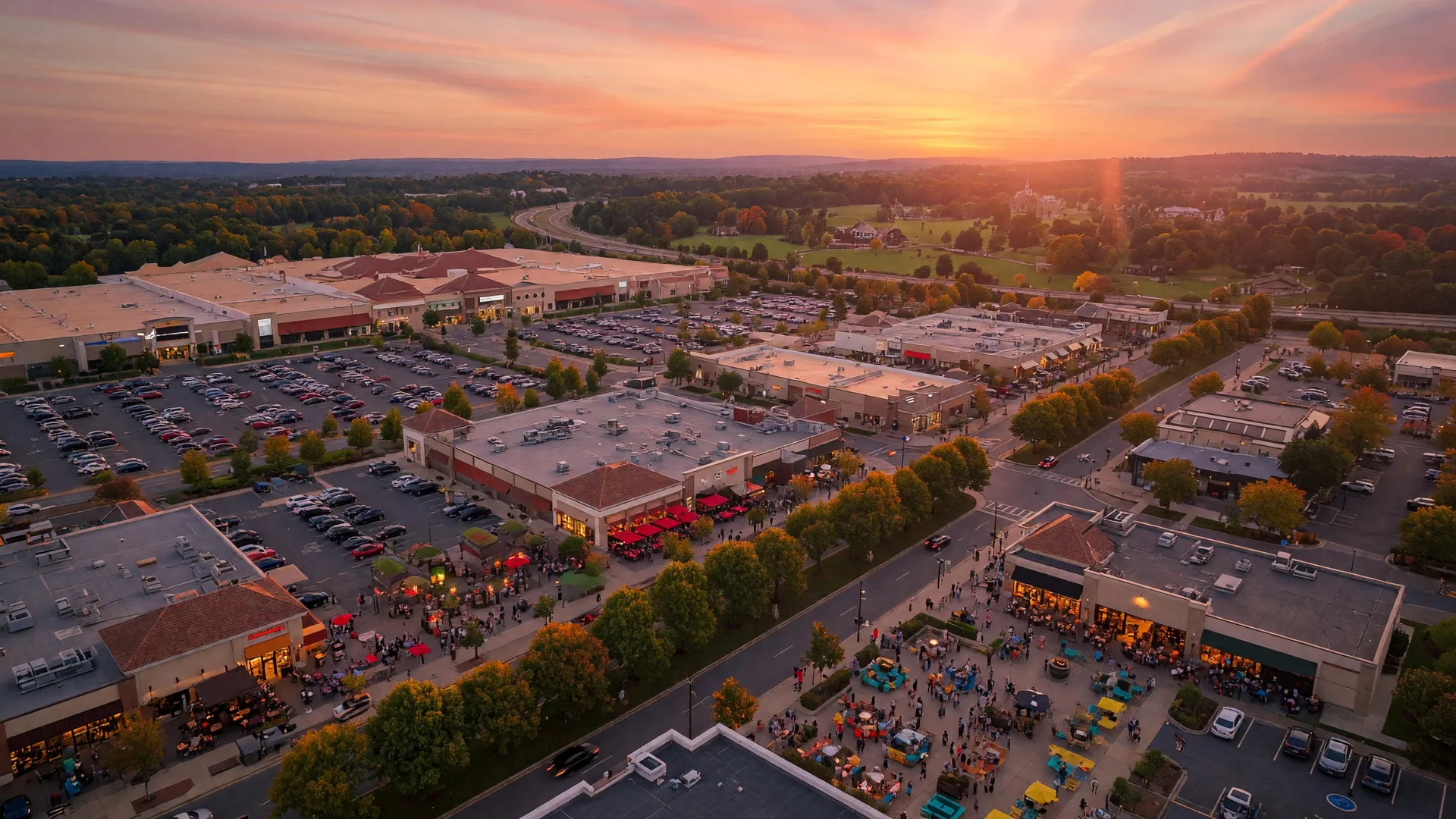 Aerial view of King of Prussia shopping and dining district at golden hour