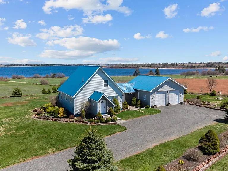 Aerial view of 54 Hatton Road showing the coastal setting