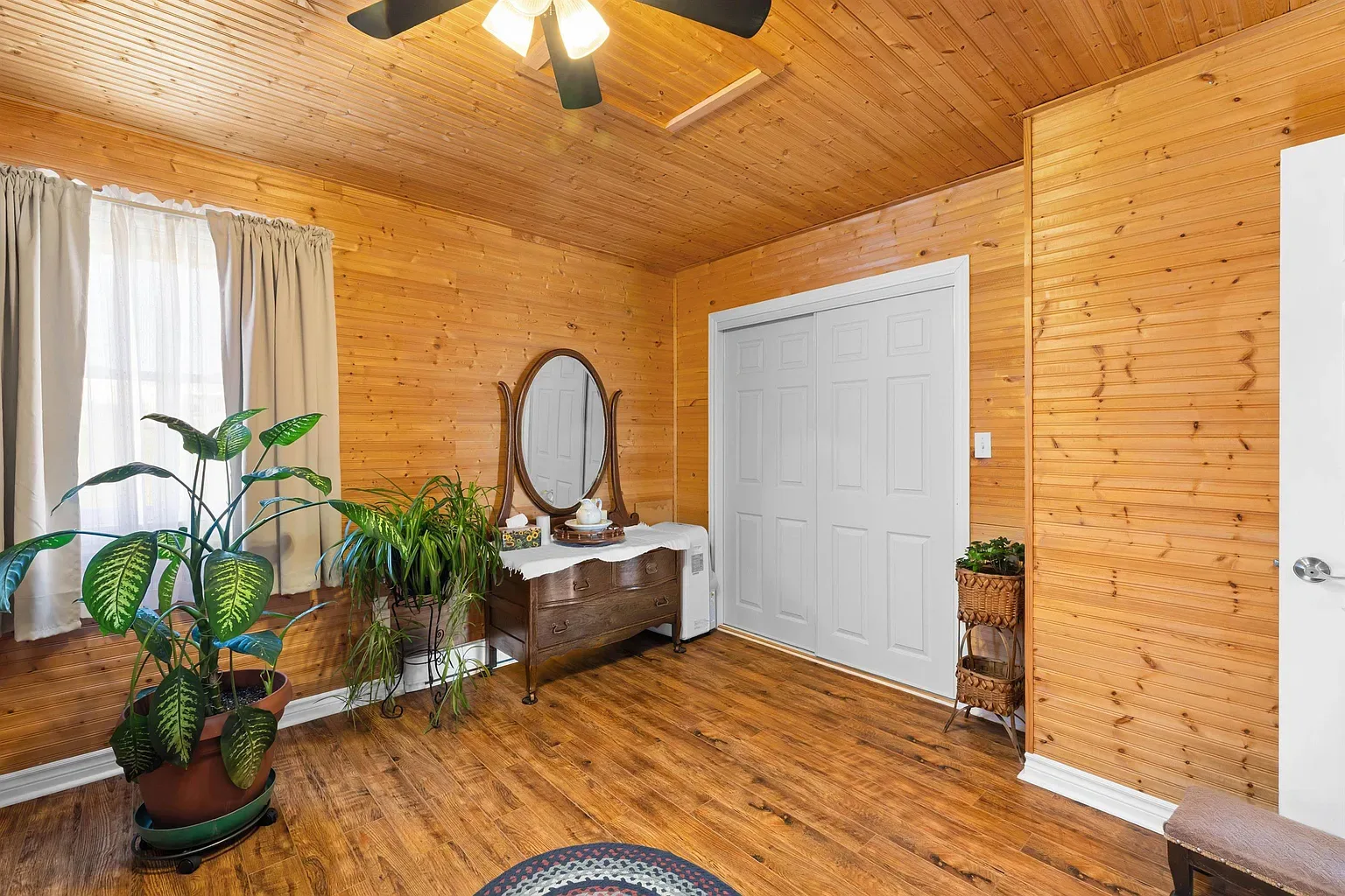 Bedroom with knotty pine walls