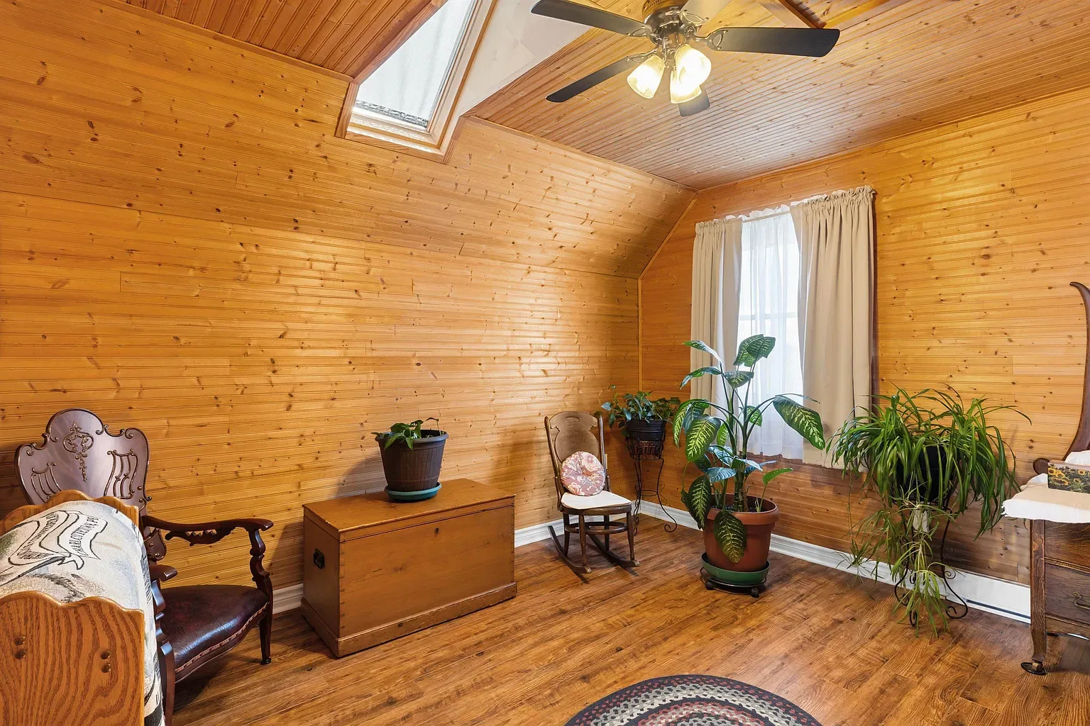 Knotty pine bedroom with skylight
