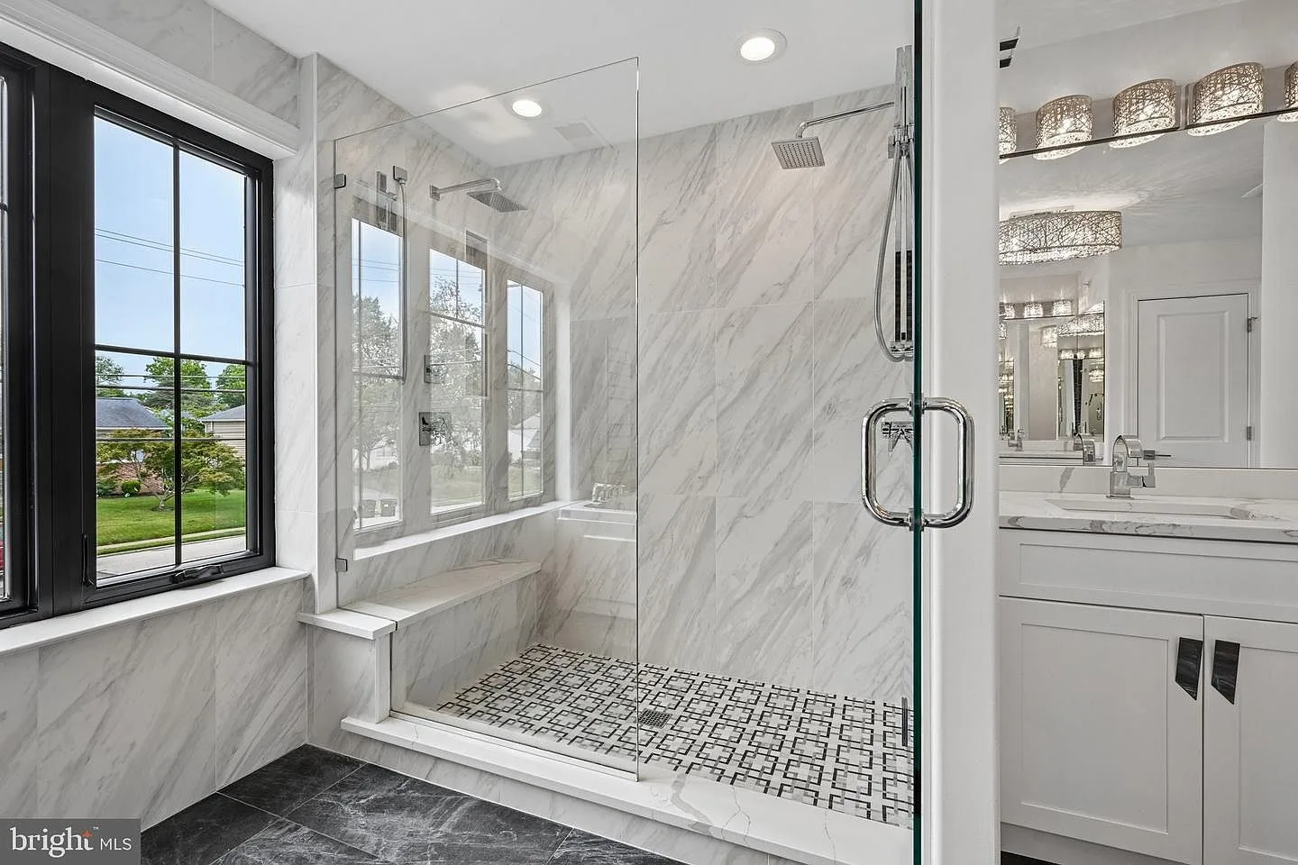 Primary bathroom frameless glass shower
