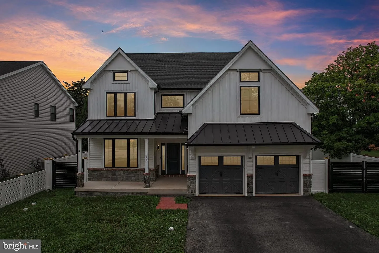 340 Anderson Rd custom residence front facade at dusk