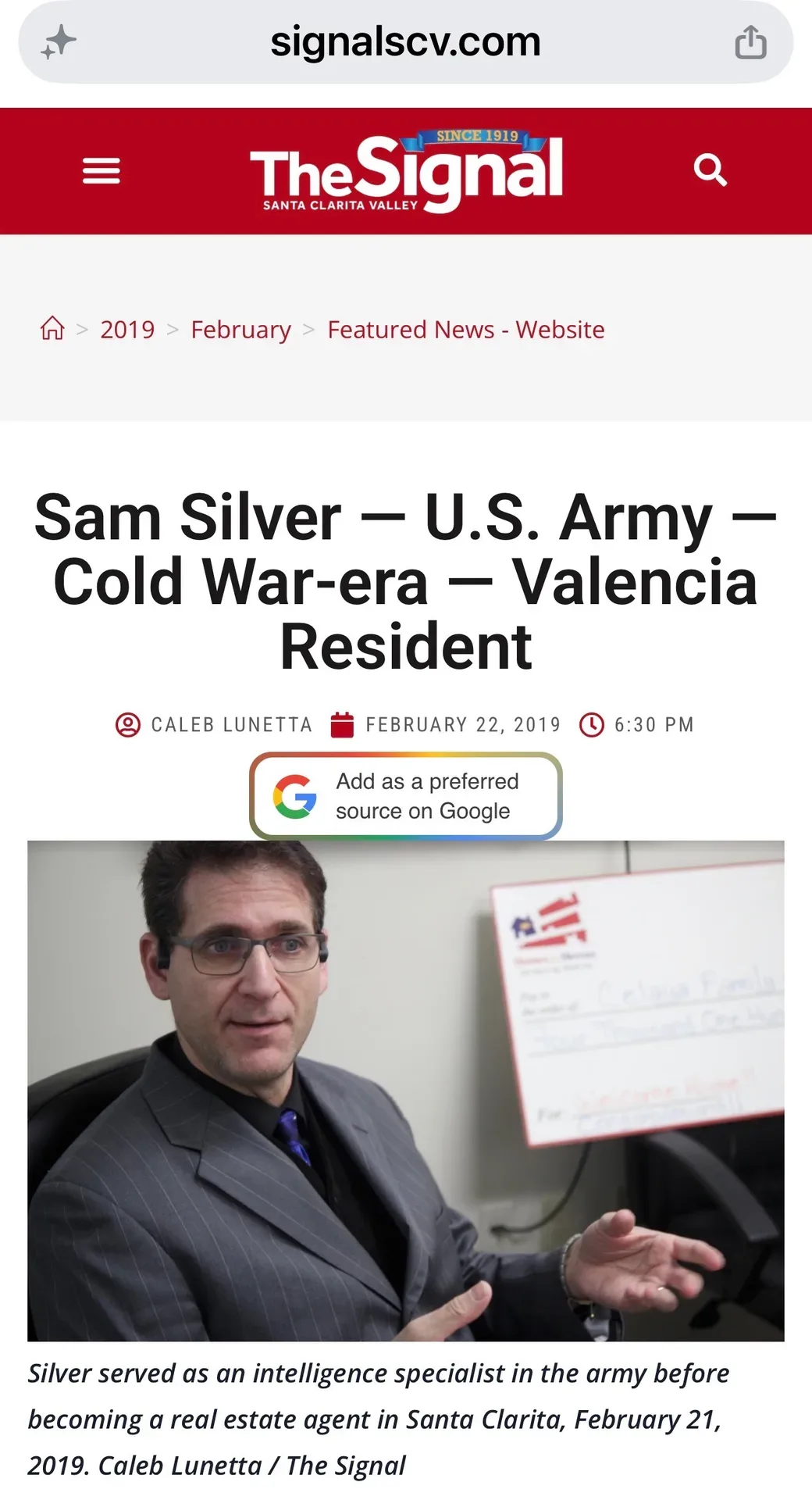 Sam Silver in his professional office, as featured in The Signal newspaper — a veteran REALTOR serving Southern California