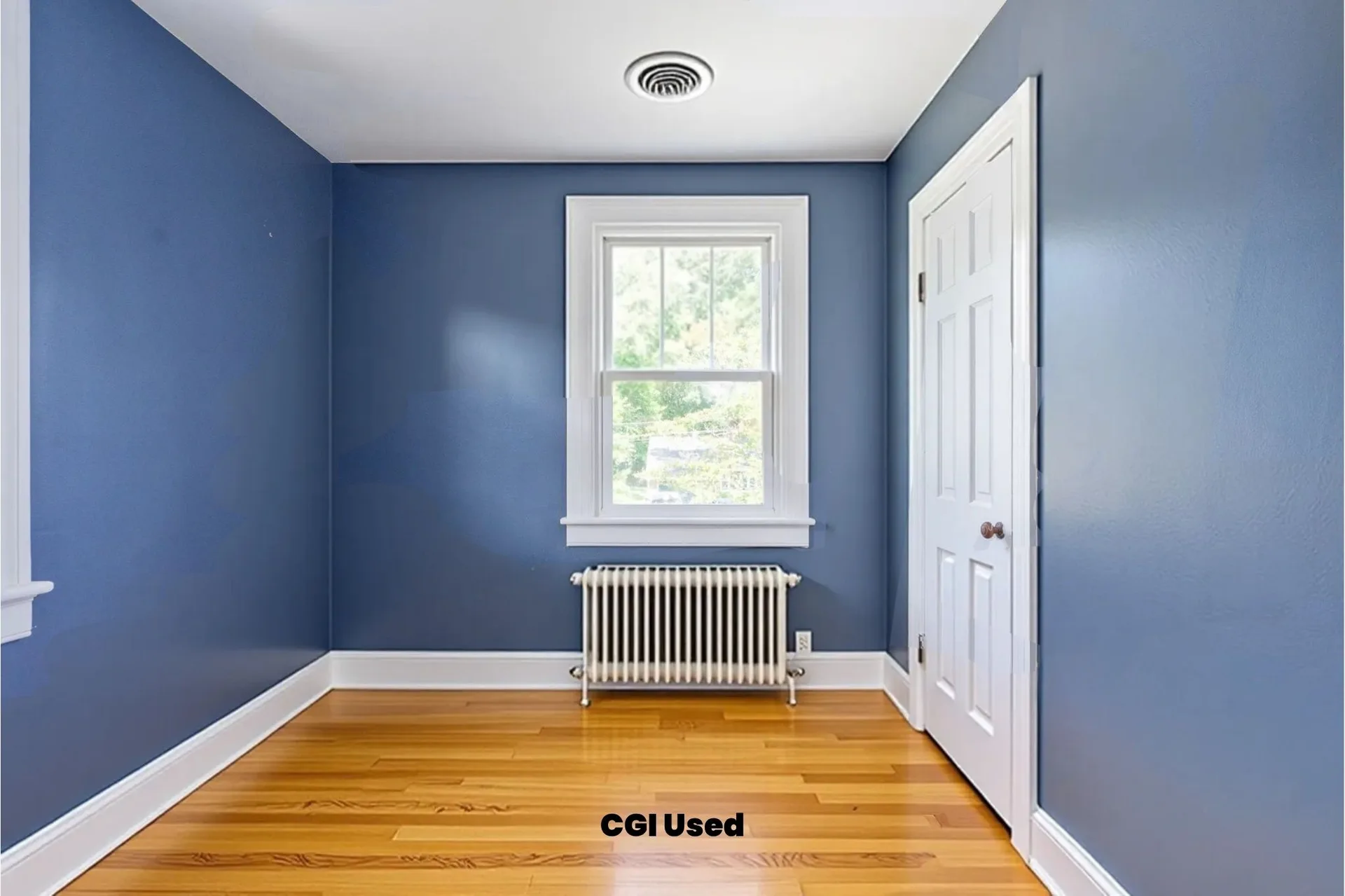 Bedroom with hardwood floors and white trim