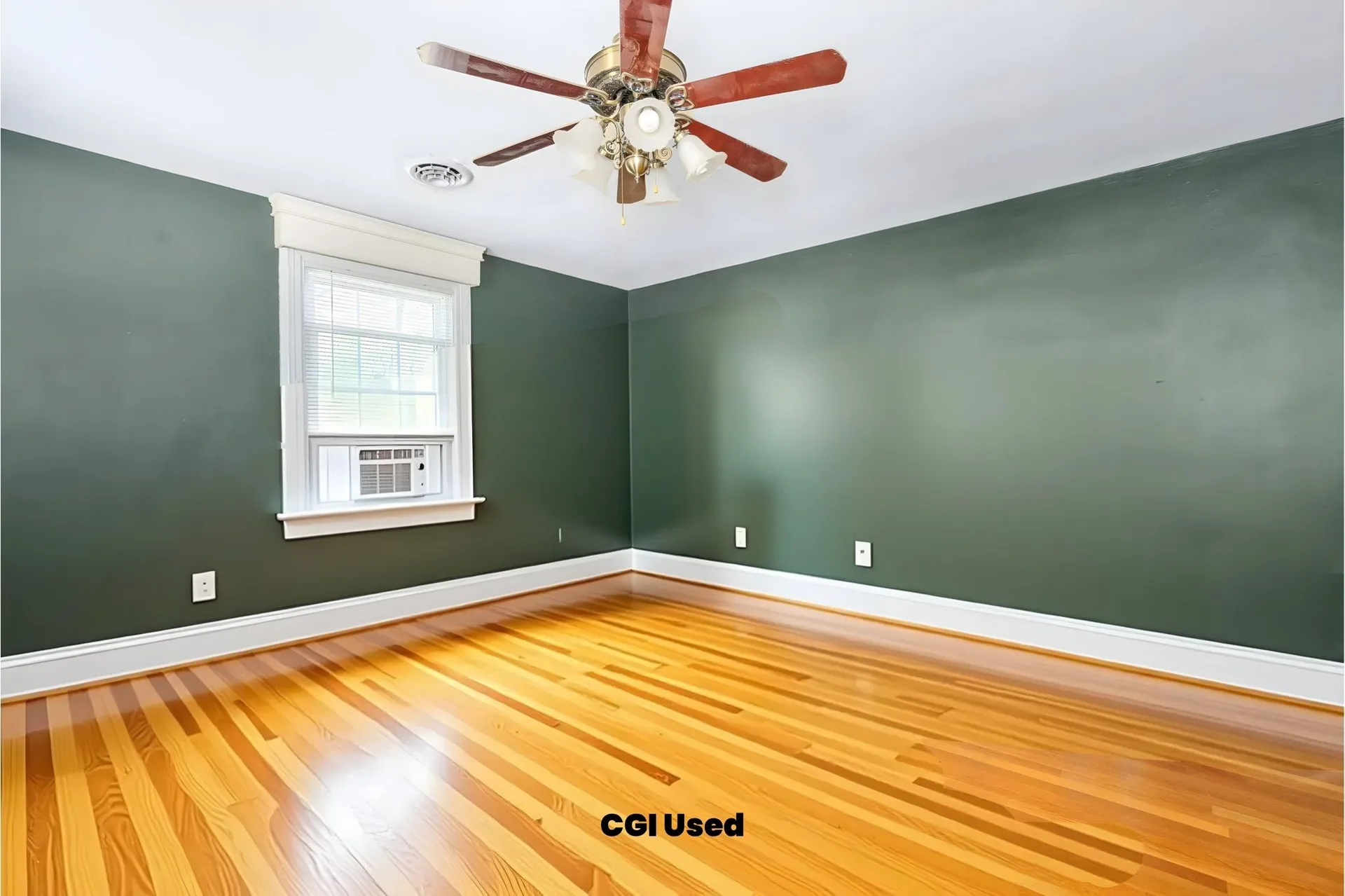 Bedroom with light hardwood floors and dark green walls