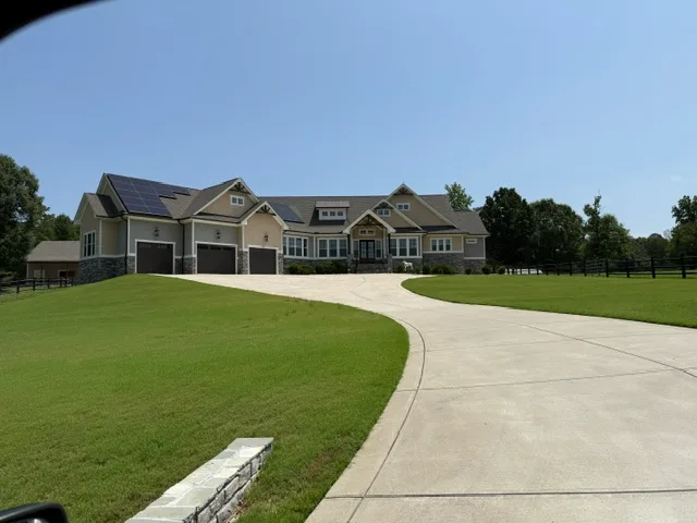 Exterior facade with driveway at Portofino community