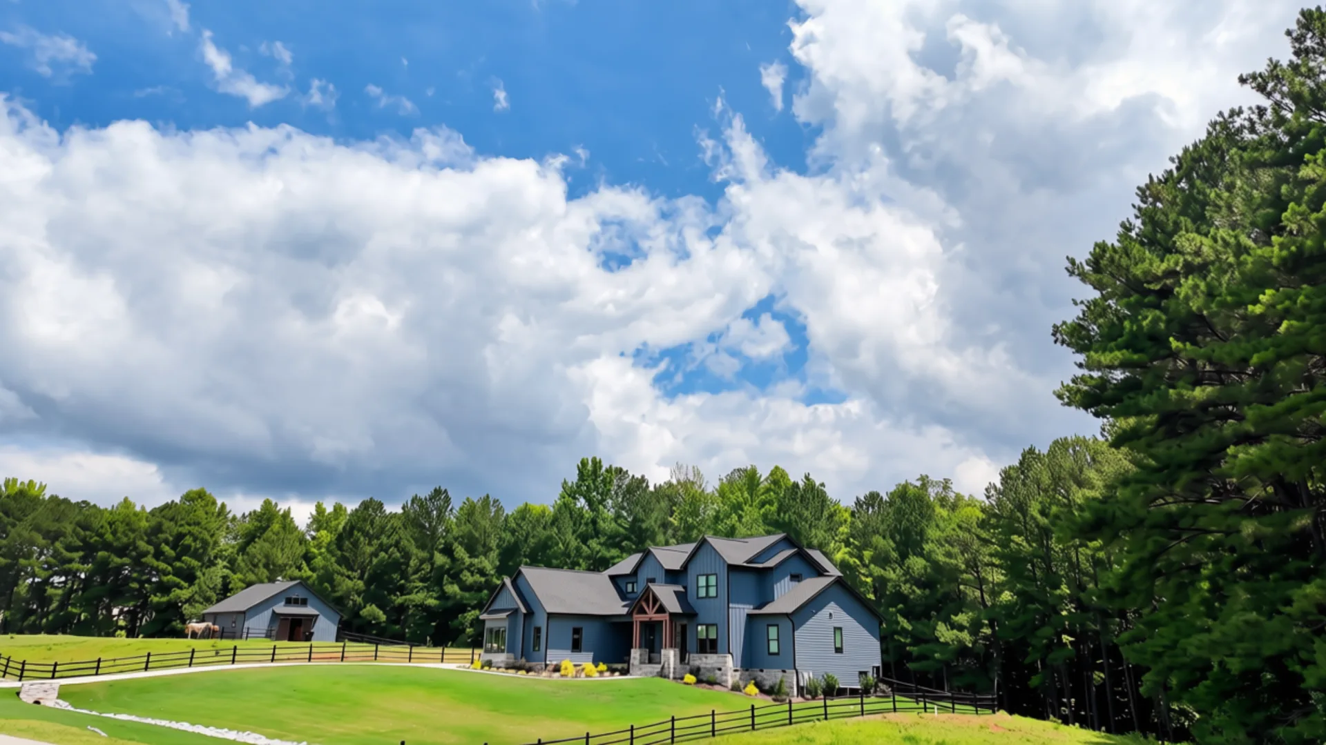 Blue farmhouse facade at Portofino community