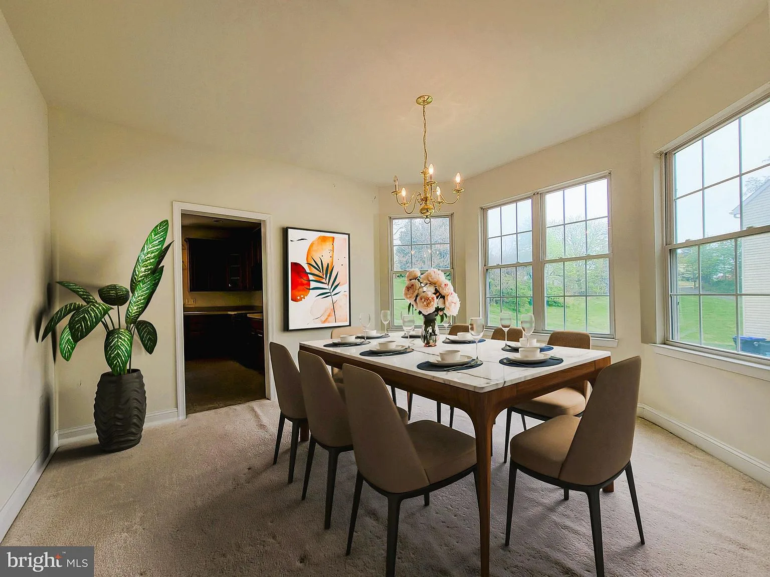 Formal dining room with table and chandelier