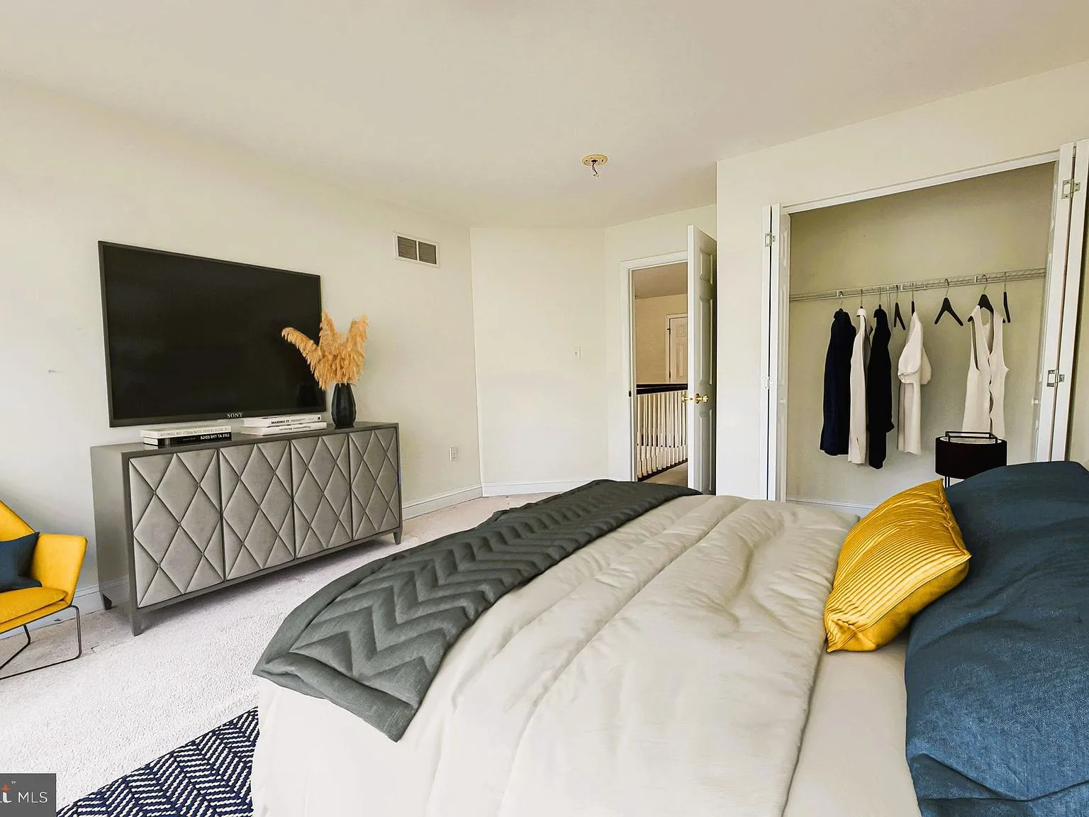 Primary bedroom with closet area